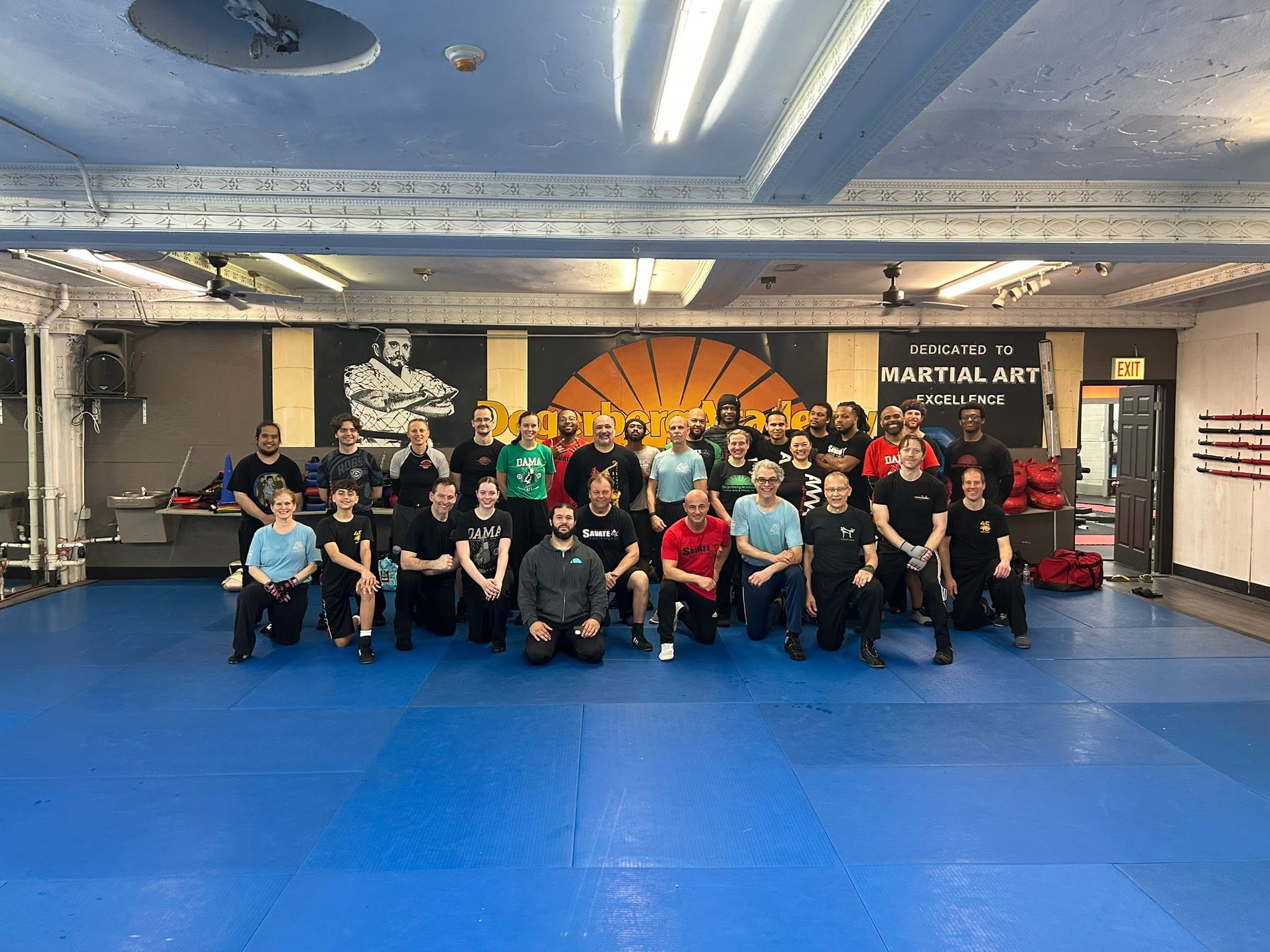 Degerberg Academy students and families together on the training mats